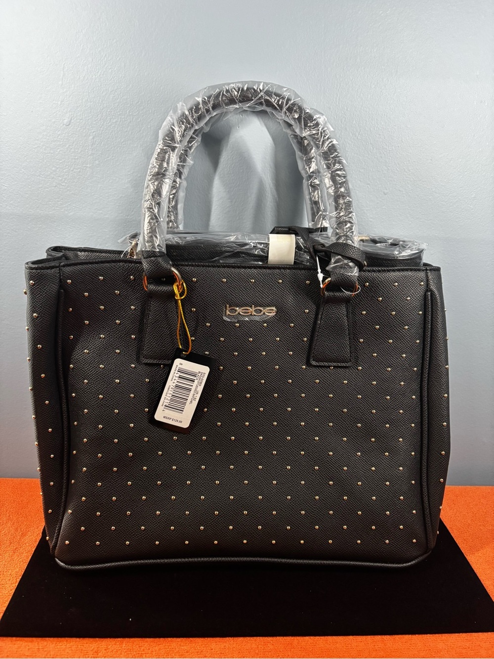 Bebe Sagan Black Satchel with Gold Stud Accents